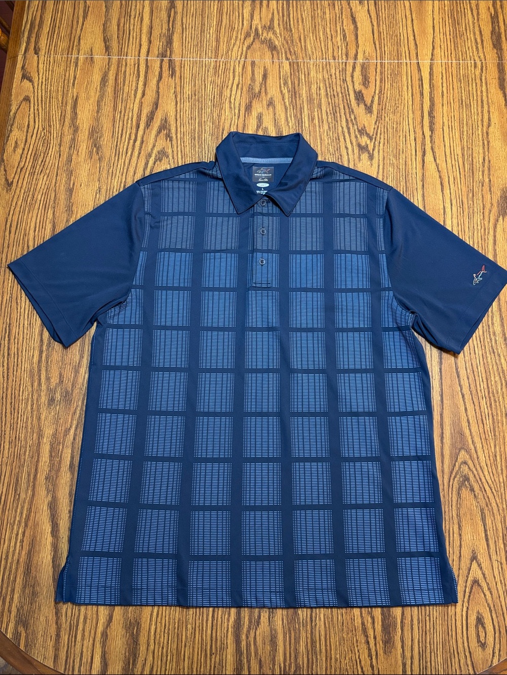 Greg Norman for Tasso Ella golf polo